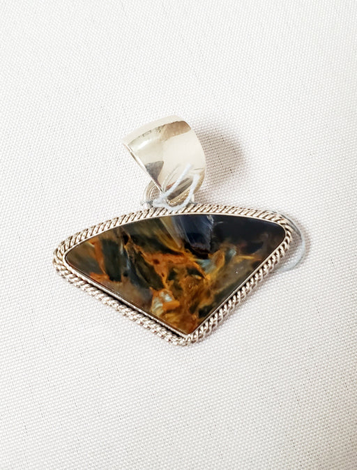 Photo of Pietersite pendant with silver twist wire by Artie Yellowhorse