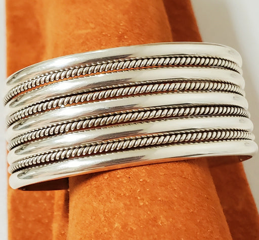 Photo of 5 row silver/4 row twist wire cuff by Artie Yellowhorse