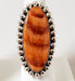 Photo of Oval Orange/Red Spiny Oyster Shell and silver ring by Artie Yellowhorse