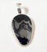 Photo of Psilomelane (stone) pendant by Artie Yellowhorse