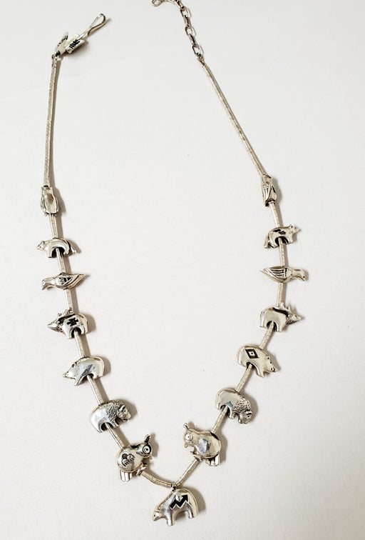 Photo of Single strand silver bead chain with 15 cast silver Fetish animals necklace by Christin Wolf