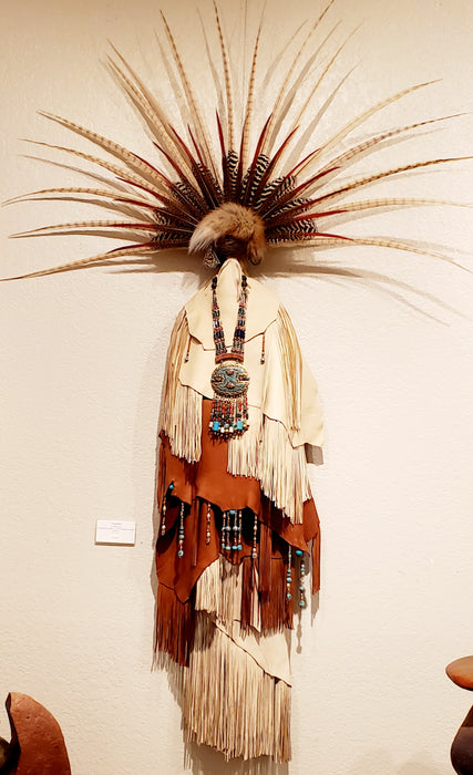 Photo of wall sculpture with Cream and brown leather - peacock and ringneck pheasant feathers