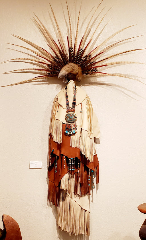 Photo of wall sculpture with Cream and brown leather - peacock and ringneck pheasant feathers