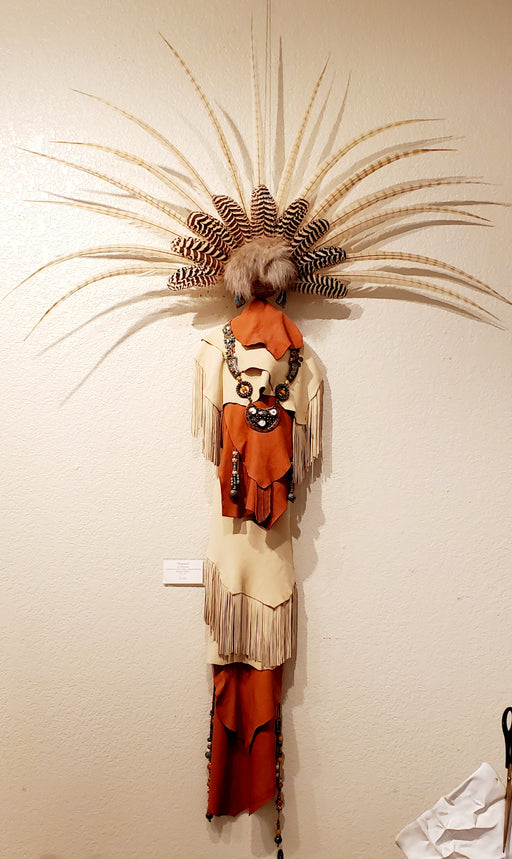 Photo of wall sculpture with Cream and burnt sienna leather, peacock and ringneck pheasant feathers 