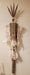 Photo of wall sculpture with Black and White Mudcloth - Fossil Face - 4 Lady Amherst Feathers