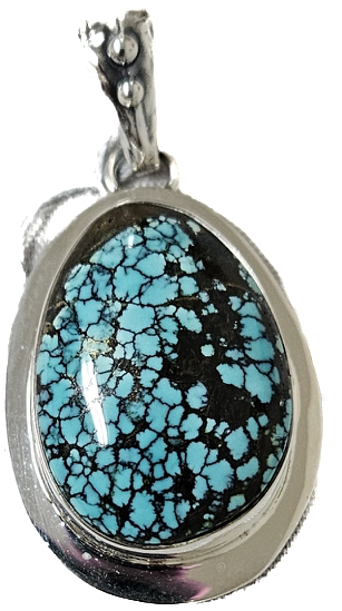 Photo of turquoise and silver pendant by Pam Springall