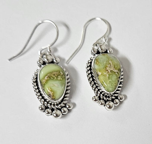 Photo of jewelry by Artie Yellowhorse