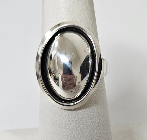 Photo of jewelry by Artie Yellowhorse