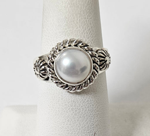 Photo of jewelry by Artie Yellowhorse