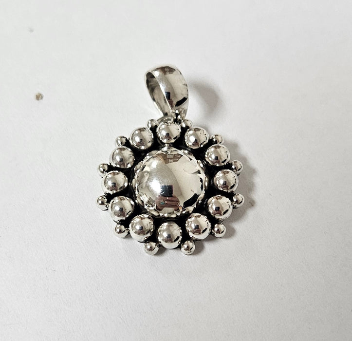 Photo of jewelry by Artie Yellowhorse