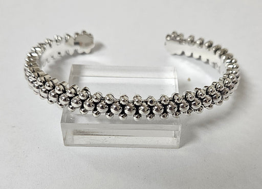 Photo of jewelry by Artie Yellowhorse