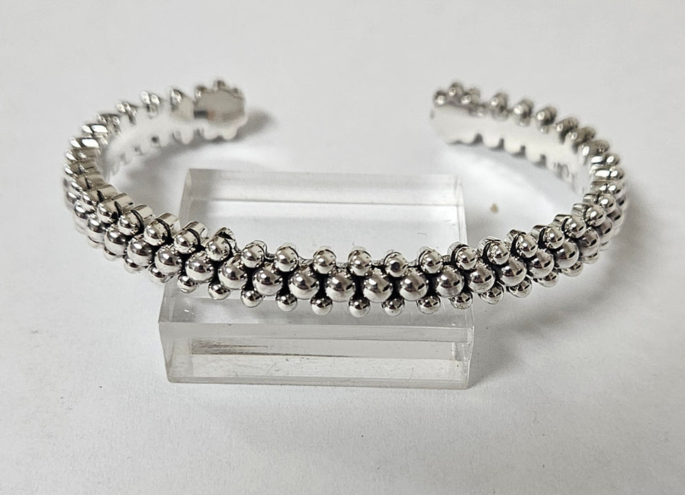 Photo of jewelry by Artie Yellowhorse