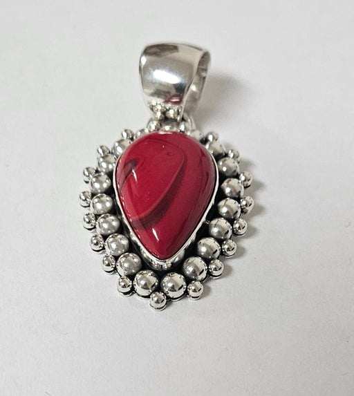 Photo of jewelry by Artie Yellowhorse