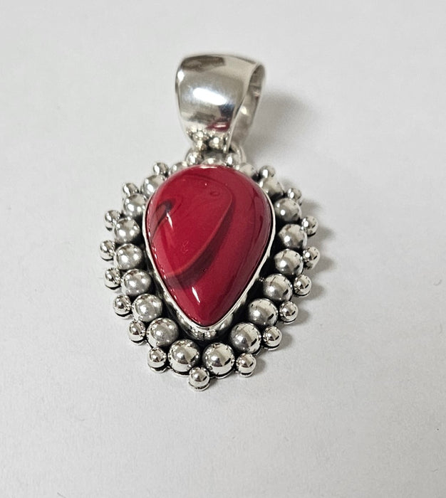 Photo of jewelry by Artie Yellowhorse