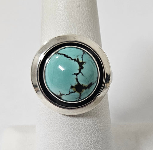 Photo of jewelry by Artie Yellowhorse