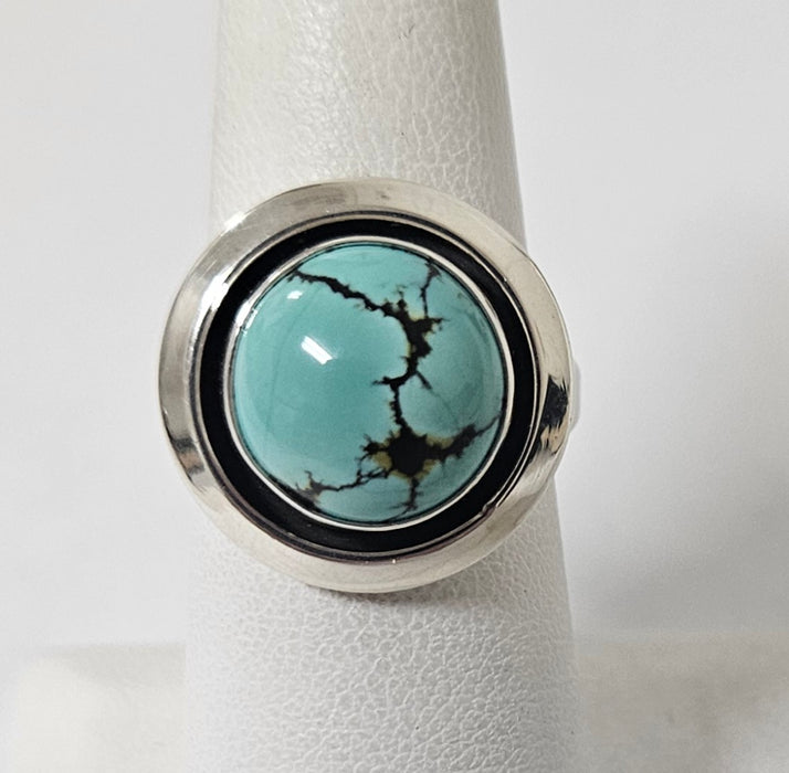 Photo of jewelry by Artie Yellowhorse