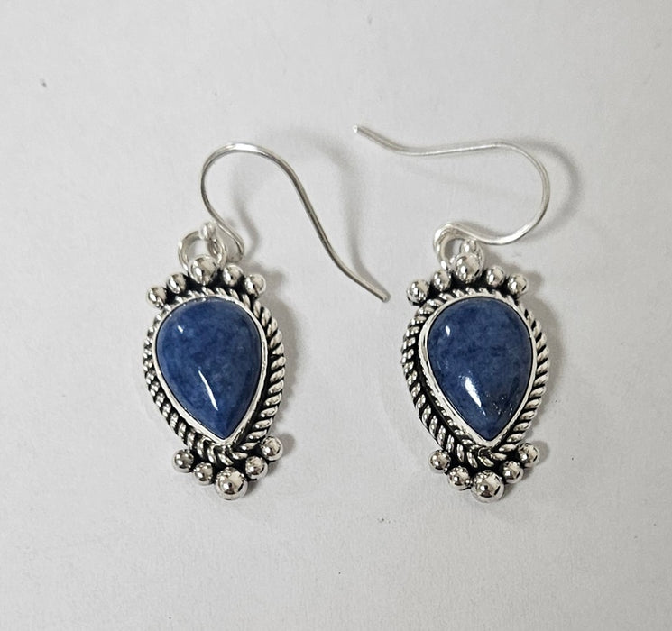 Photo of jewelry by Artie Yellowhorse