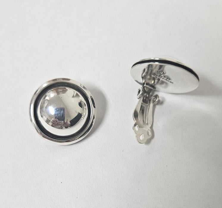 Photo of jewelry by Artie Yellowhorse