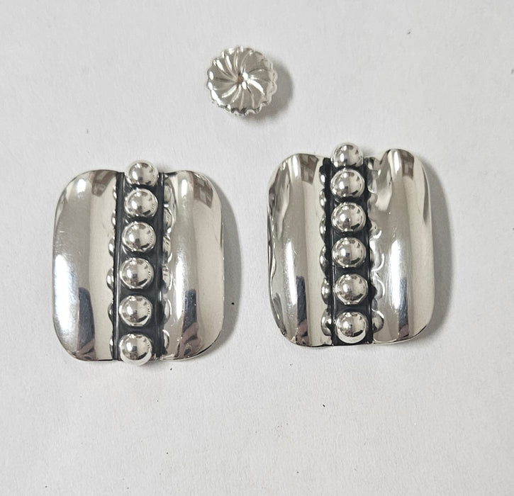 Photo of jewelry by Artie Yellowhorse