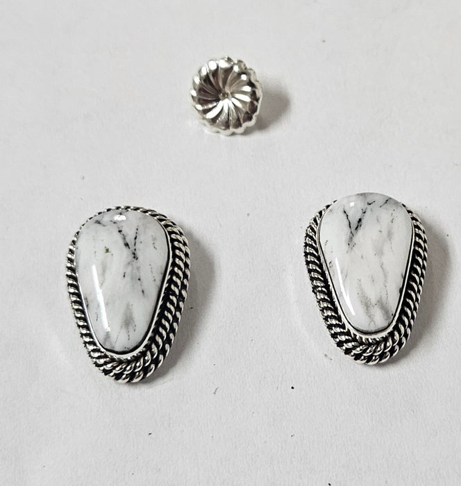 Photo of jewelry by Artie Yellowhorse