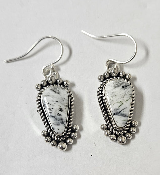 Photo of jewelry by Artie Yellowhorse