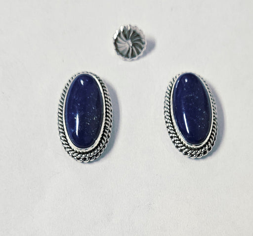 Photo of jewelry by Artie Yellowhorse