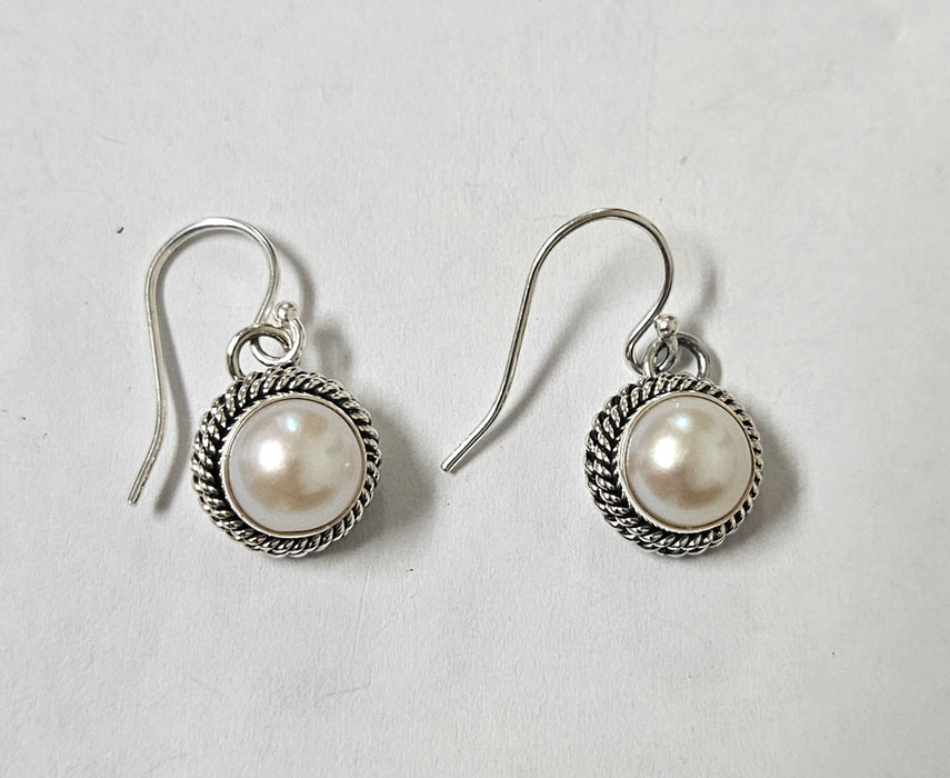 Photo of jewelry by Artie Yellowhorse