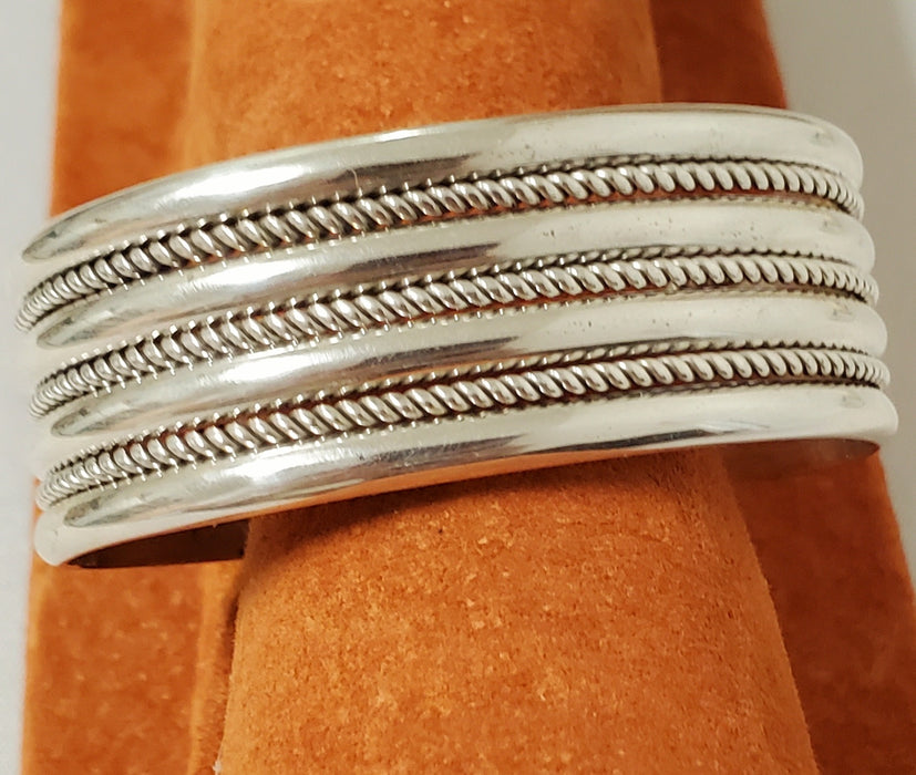 Photo of 4 row silver/3 row twist wire cuff by Artie Yellowhorse