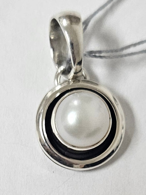 Photo of jewelry by Artie Yellowhorse