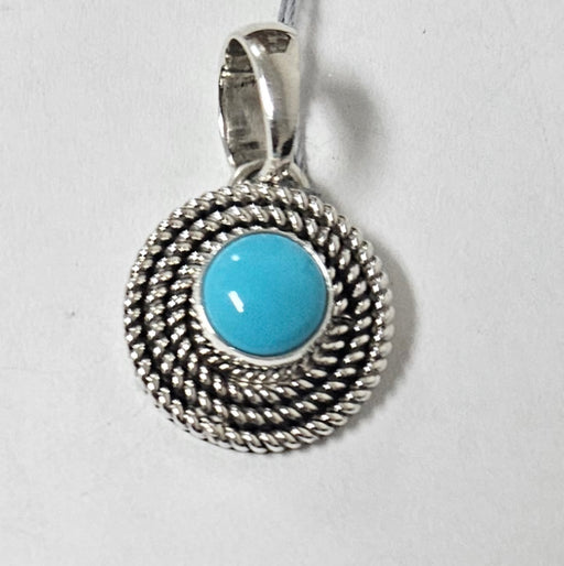 Photo of jewelry by Artie Yellowhorse