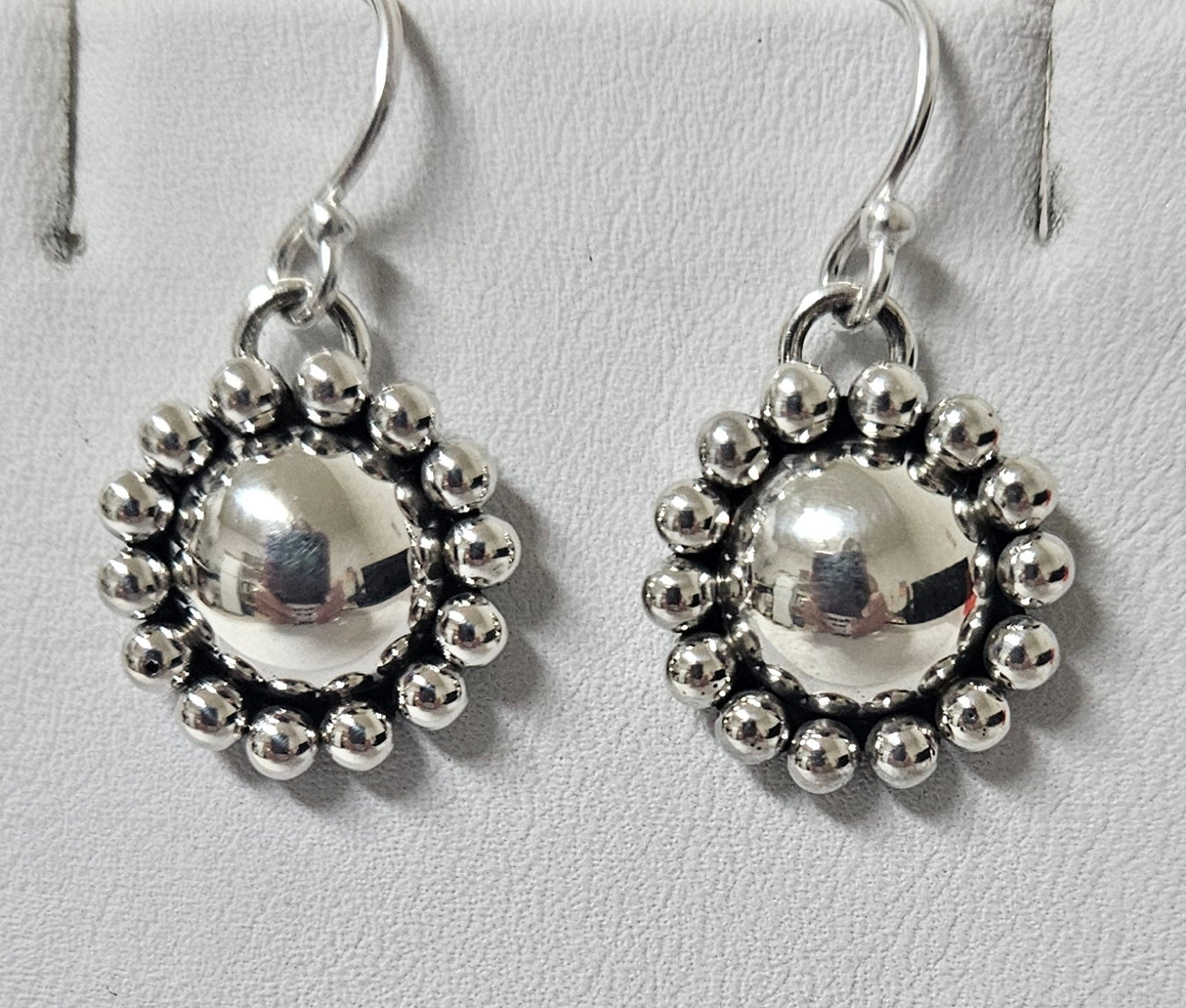 Photo of jewelry by Artie Yellowhorse