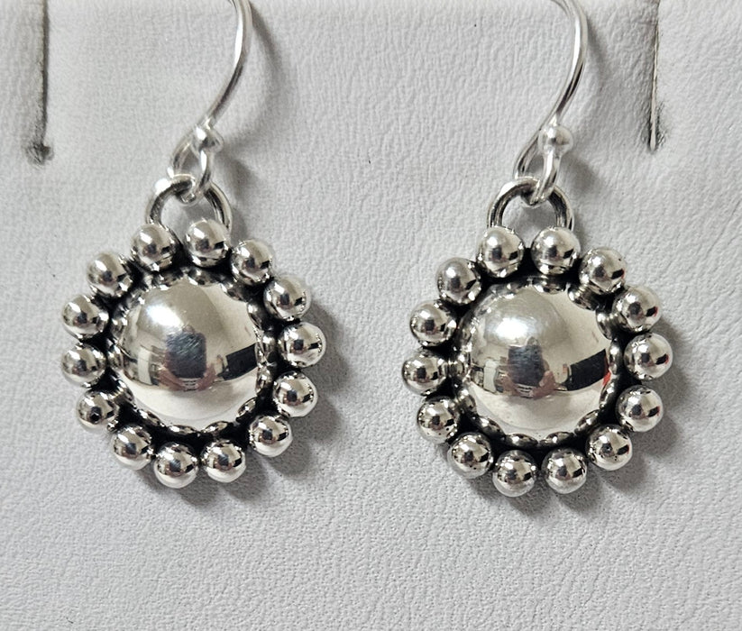 Photo of jewelry by Artie Yellowhorse