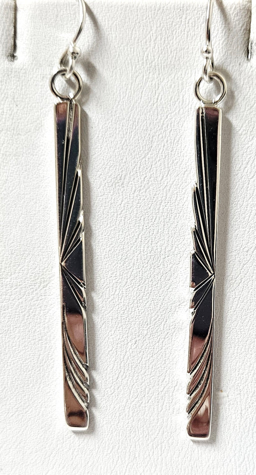 Photo of silver earring by Artie Yellowhorse