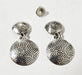 Photo of silver earring by Artie Yellowhorse