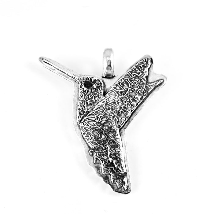 Silver hummingbird pendant on a white background
