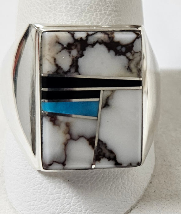 Photo of inlayed jewelry by Wayne Muskett