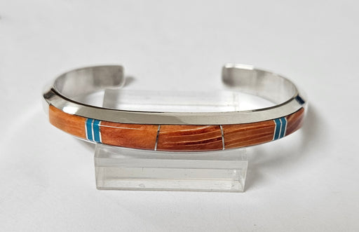 Photo of inlayed jewelry by Wayne Muskett