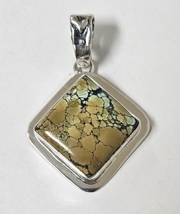 Photo of jewelry by Pam Springall