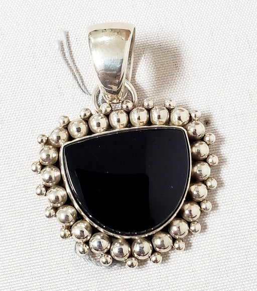 Photo of Onyx and Silver beads pendant by Artie Yellowhorse