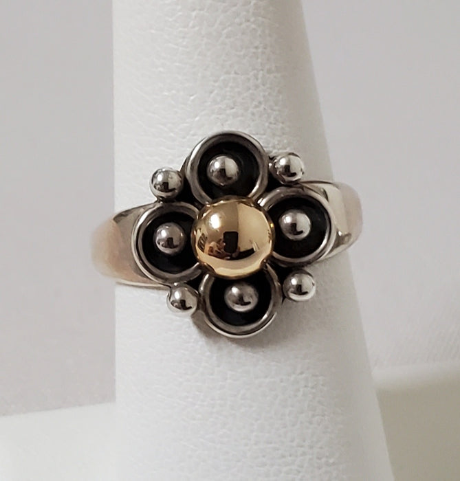 photo of Silver clover design ring with 14k gold center bead