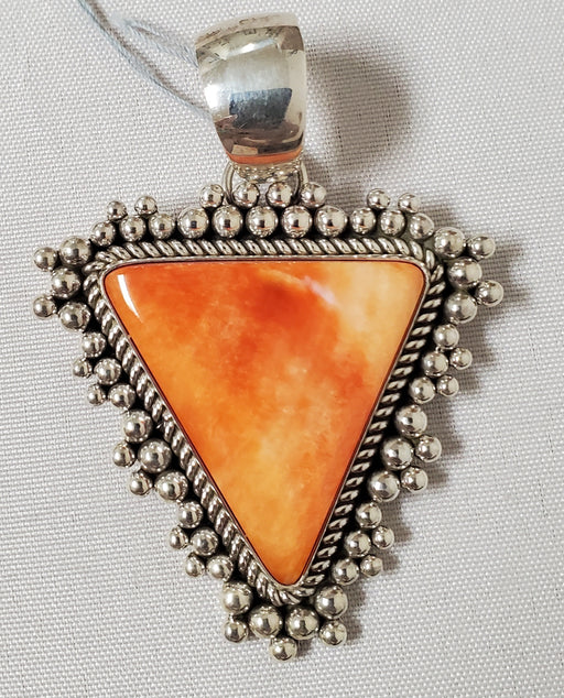 Photo of Spiny Oyster Shell Pendant by Artie Yellowhorse