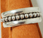 Photo of wide silver cuff with lg silver beads by Artie Yellowhorse