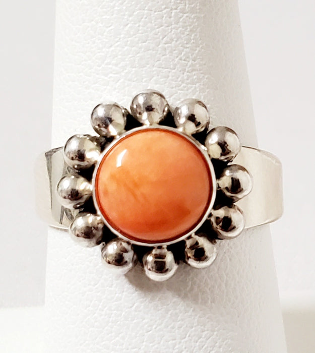 Photo of Round Orange Spiny Oyster Shell and silver ring by Artie Yellowhorse
