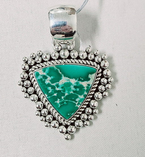 Photo of silver and Variscite pendant by Artie Yellowhorse