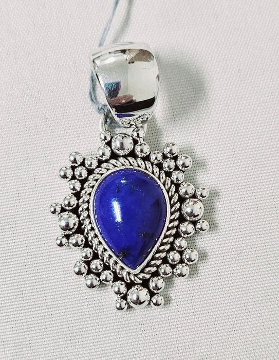 Photo of silver and Lapis pendant by Artie Yellowhorse