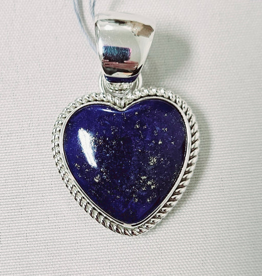 Photo of silver and Lapis pendant by Artie Yellowhorse