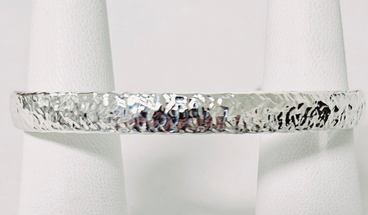 Photo of silver  cuff by Artie Yellowhorse