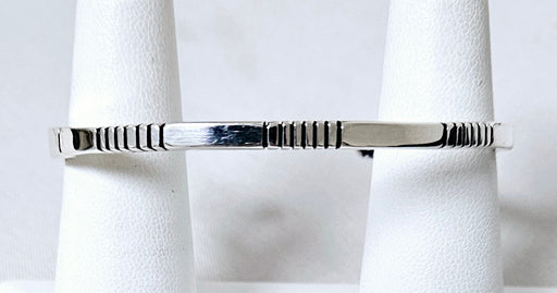 Photo of Silver bracelet by Artie Yellowhorse