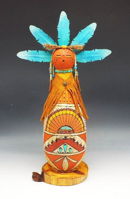 Gourd sculpture with native painting and turquoise feathers
