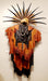 Photo of wall sculpture withBlack and Brown leather, reeves and black dyed pheasant feathers